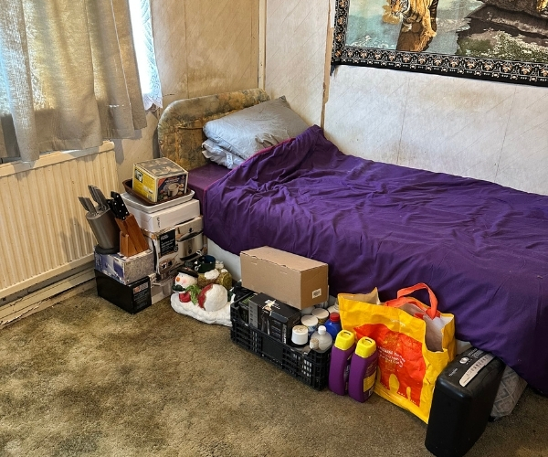 Bedroom cleared and organised after Morris Movers removed unwanted items and grouped the remaining belongings neatly in Thanet.